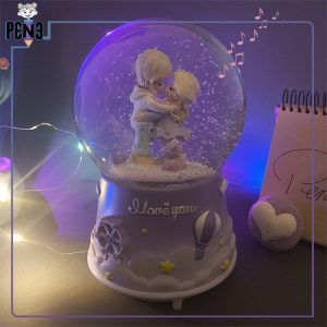 گوی موزیکال پمپی عاشقانه برفی بنفش بوسه