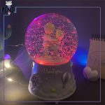 گوی موزیکال پمپی عاشقانه برفی بنفش بوسه