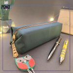 جامدادی ساده باریک برزنتی زیپ نارنجی سبز