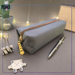 جامدادی ساده باریک برزنتی زیپ نارنجی طوسی