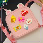 کیف کوله سیلیکونی پیکوسیسی طرح کراکس اکسسوری دار picocici صورتی