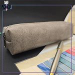 جامدادی چرم مصنوعی باریک تک زیپ کرم رنگ طرح دار